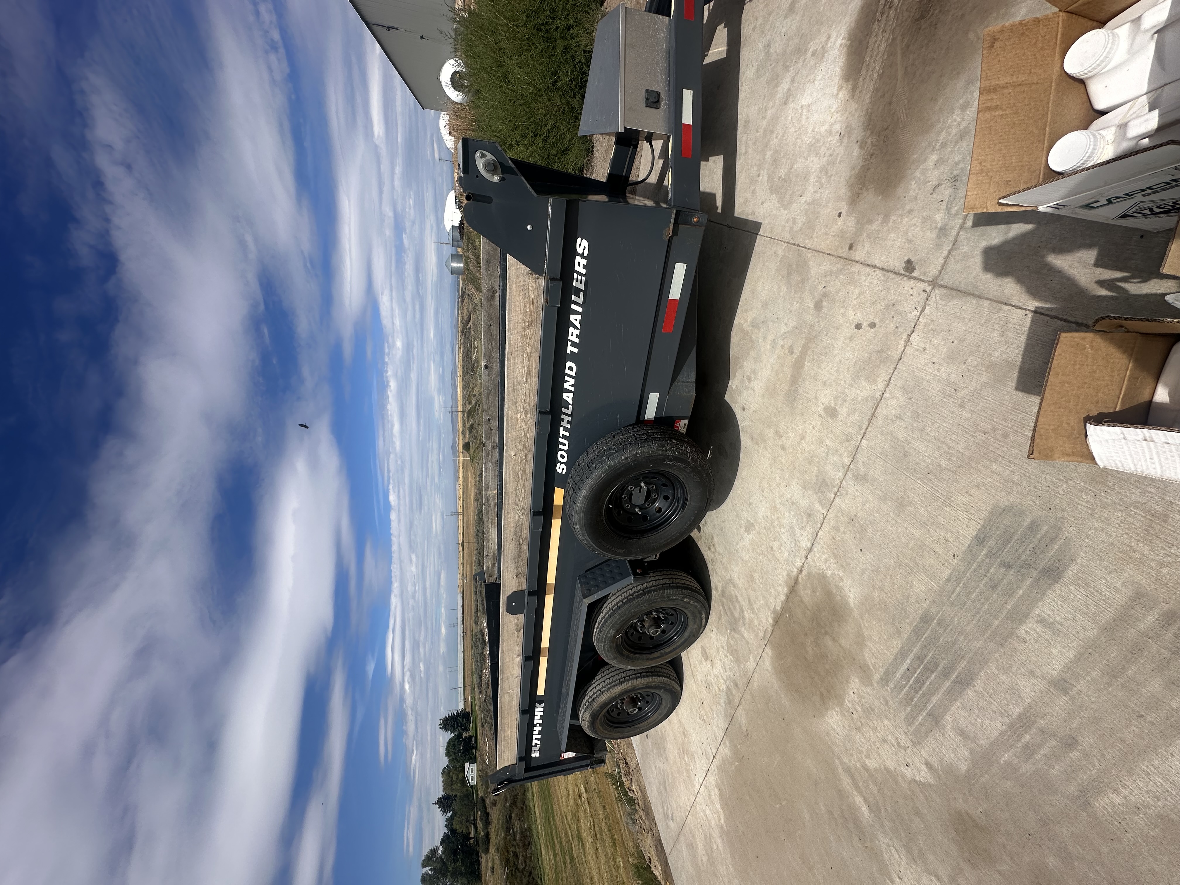 Dump trailer rental in Sugar City, Idaho — 7x14 hydraulic dump trailer